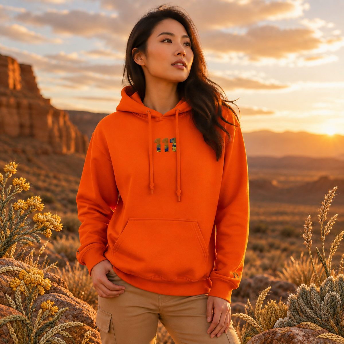 111 Desert Angel Number Hoodie in Orange – Bright Future product image — realistic model in an embroidered nature scene.