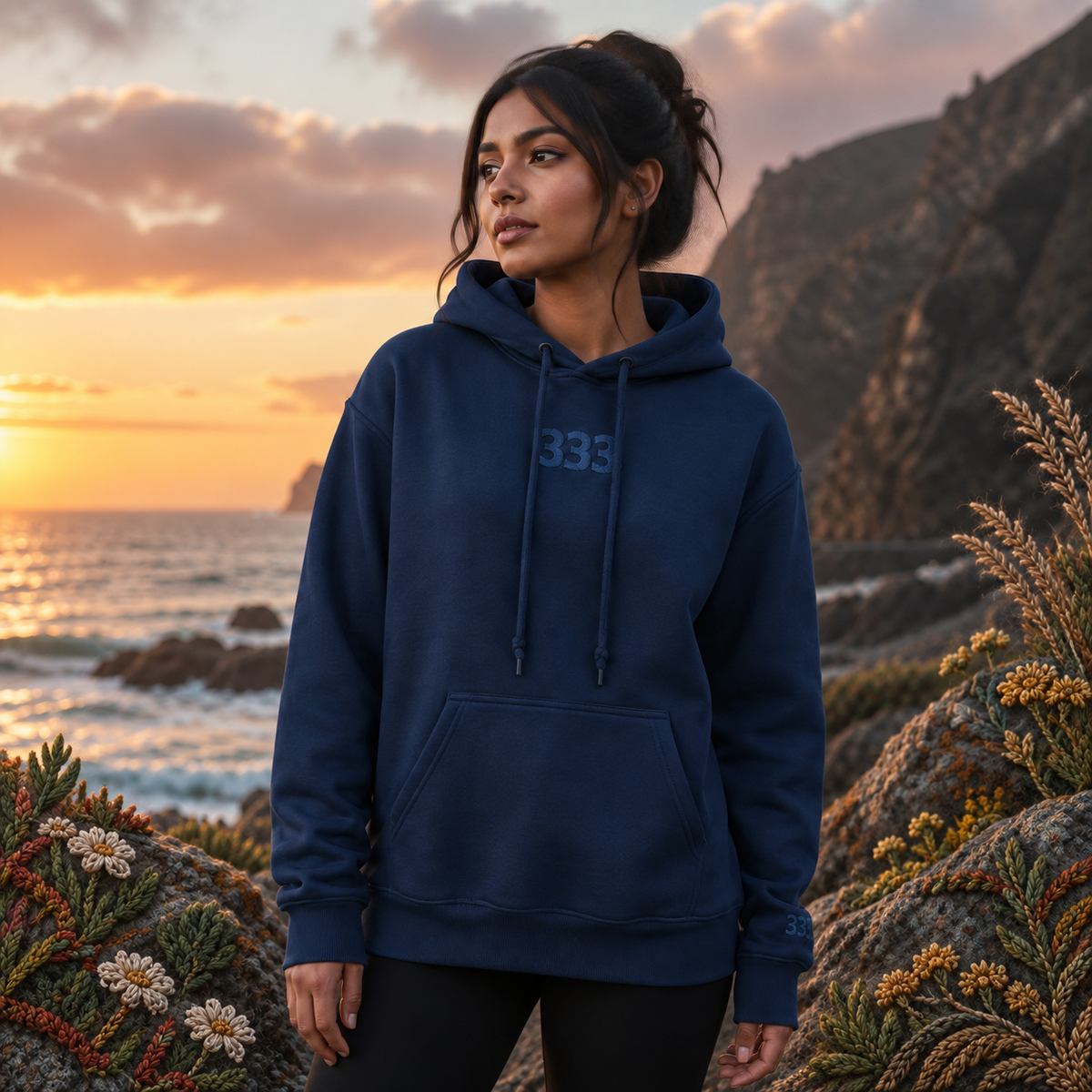 333 Ocean Angel Number Hoodie in Navy β Bright Future product image β realistic model in an embroidered nature scene.