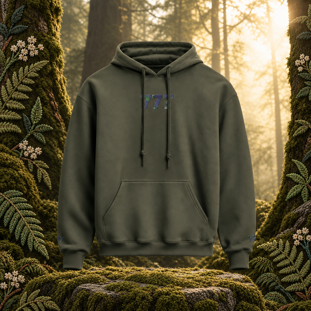 777 Forest Angel Number Hoodie in Military Green – Bright Future product image — original product in a realistic nature scene with embroidered environmental details.