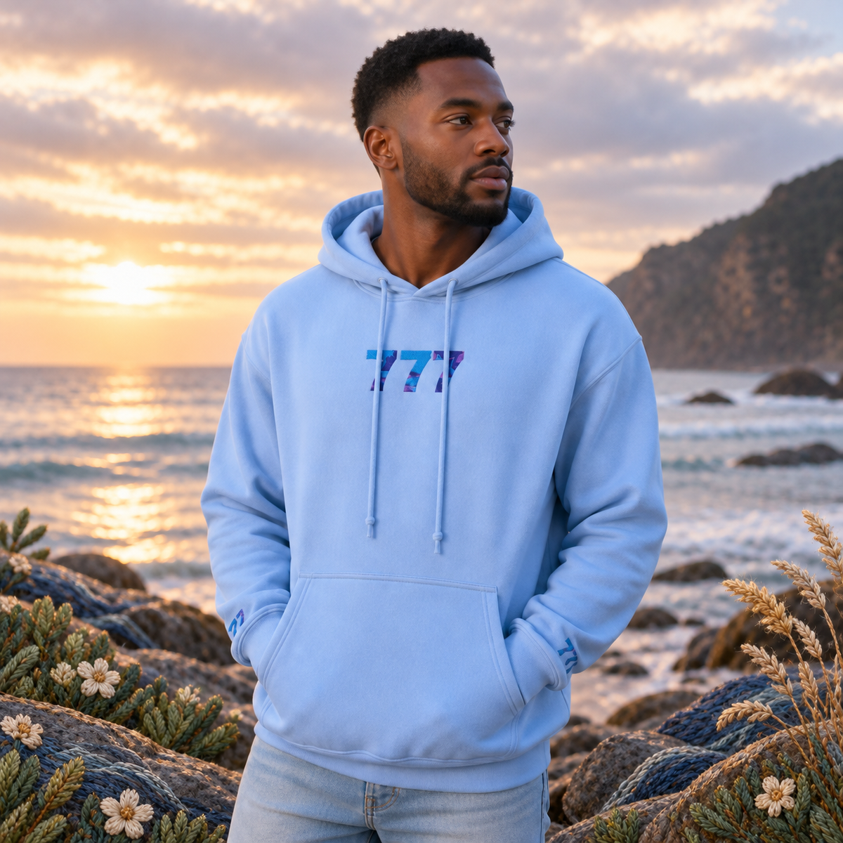 777 Ocean Angel Number Hoodie in Light Blue β Bright Future product image β realistic model in an embroidered nature scene.