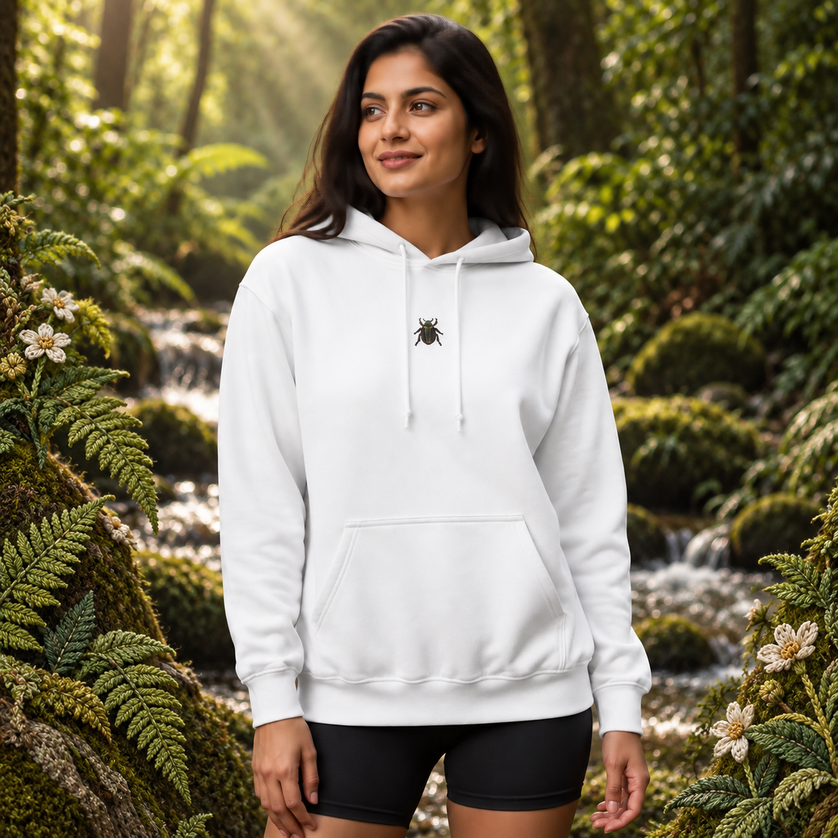 Beetle Hoodie – Resilience & Renewal in White – Bright Future product image — realistic model in an embroidered nature scene.