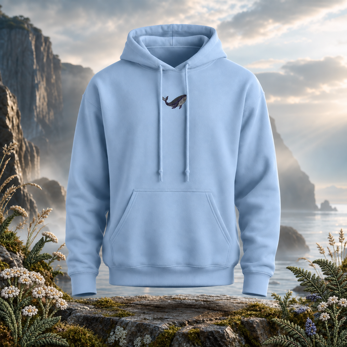 Blue Whale Hoodie – Wisdom, Depth & Serenity – Bright Future product image — original product in a realistic nature scene with embroidered environmental details.
