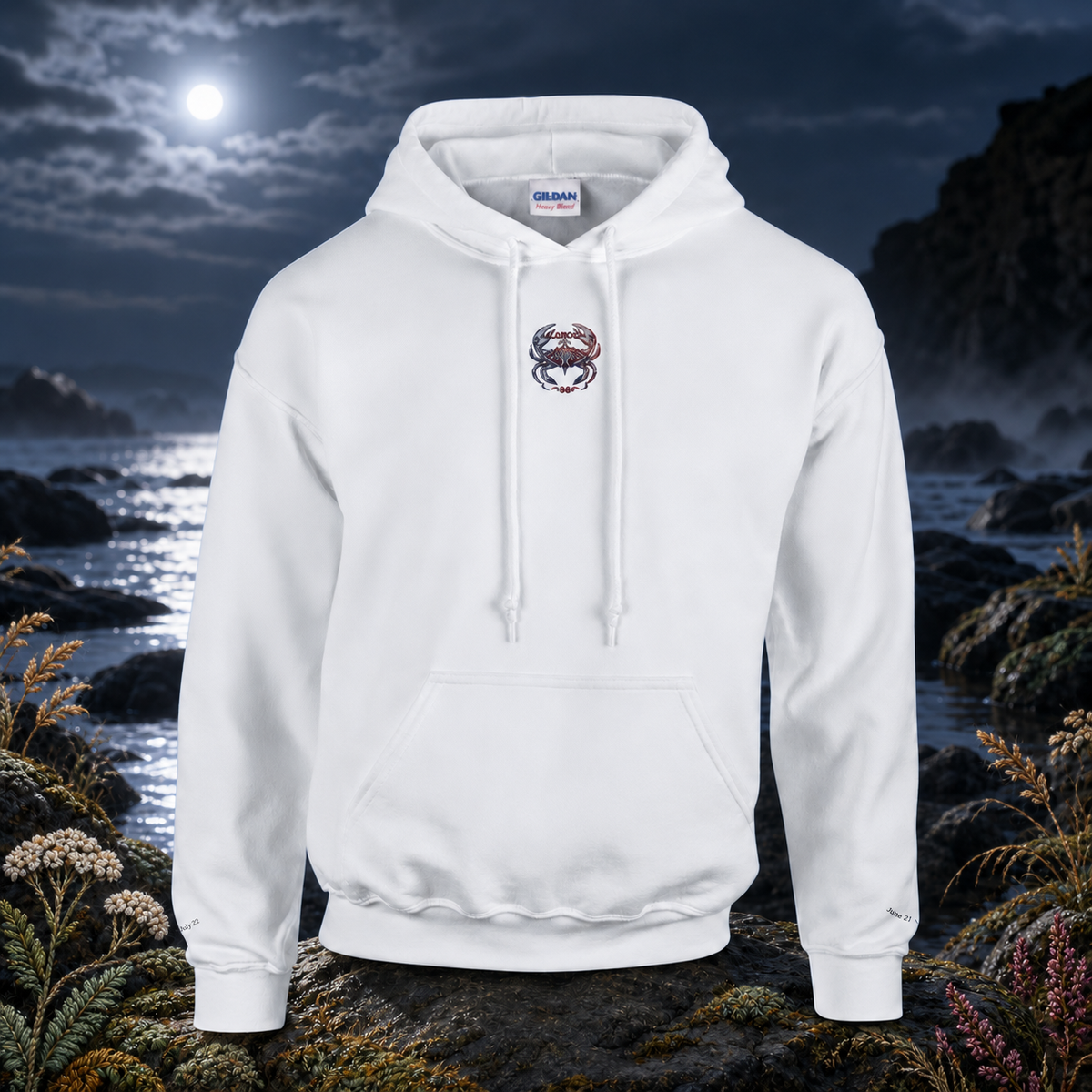 Cancer Zodiac Hoodie in White – Bright Future product image — original product in a realistic nature scene with embroidered environmental details.