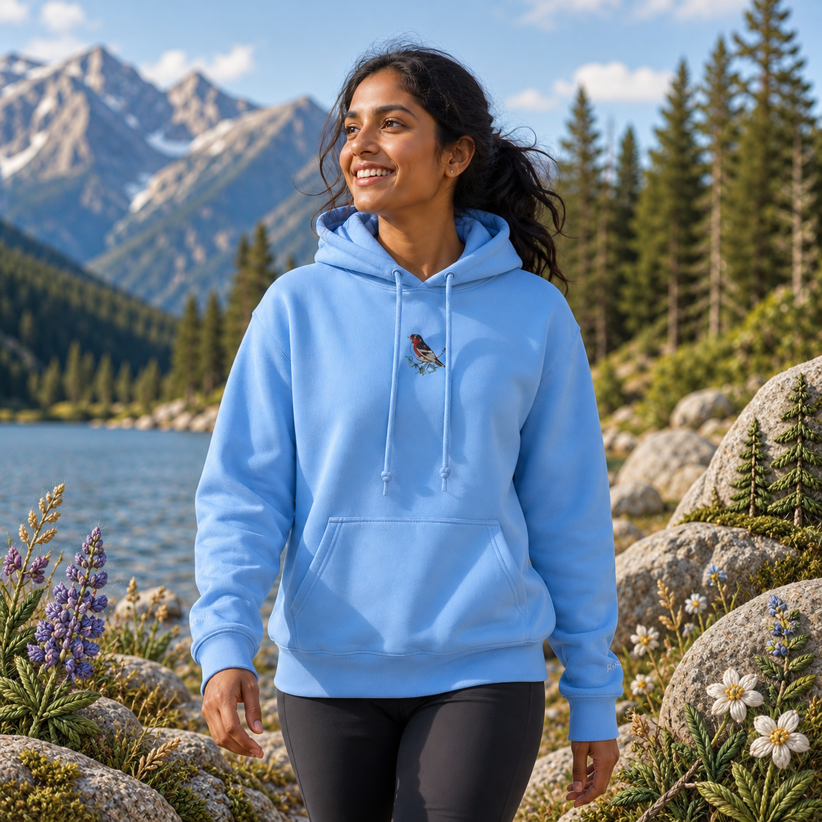 Robin Hoodie – Bright Future product image — realistic model in an embroidered nature scene.