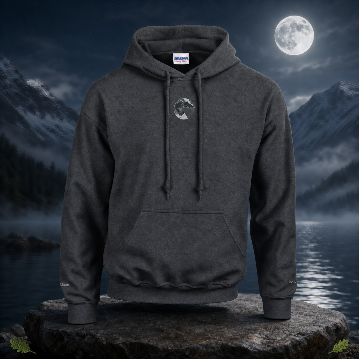 Moon Symbol Hoodie in Graphite Heather – Bright Future product image — original product in a realistic nature scene with embroidered environmental details.