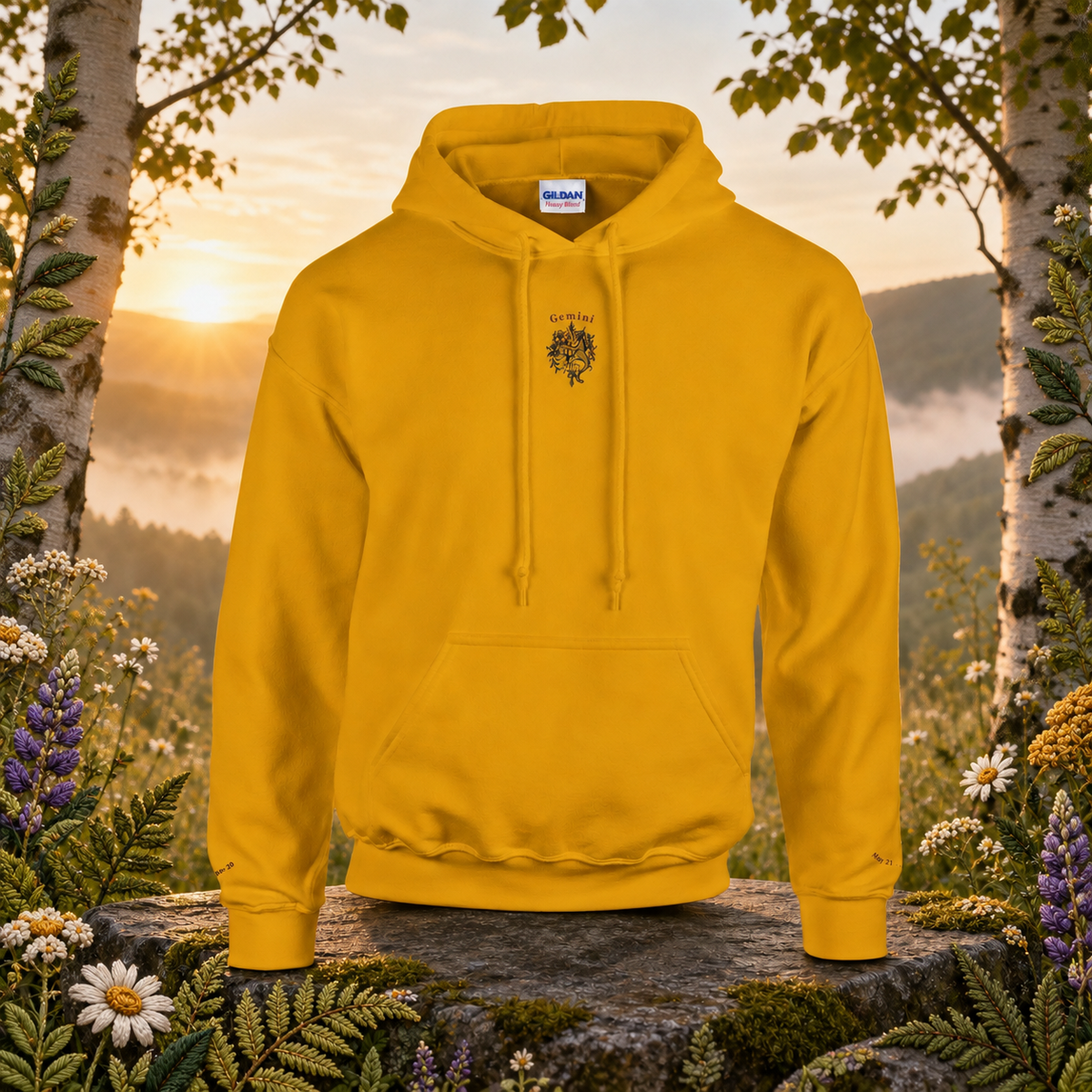 Gemini Zodiac Hoodie in Gold – Bright Future product image — original product in a realistic nature scene with embroidered environmental details.