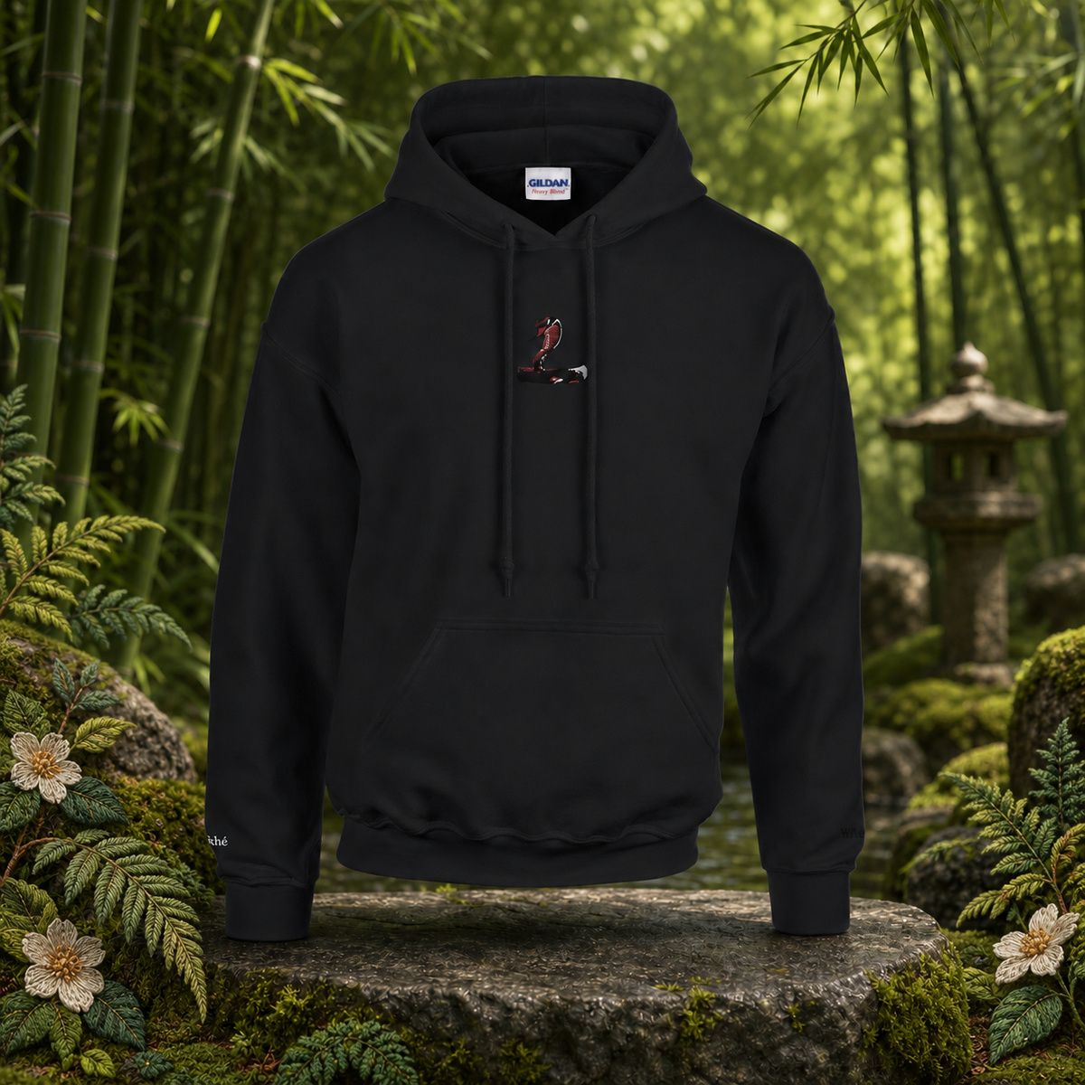 Snake Chinese Zodiac Hoodie in Black – Bright Future product image — original product in a realistic nature scene with embroidered environmental details.