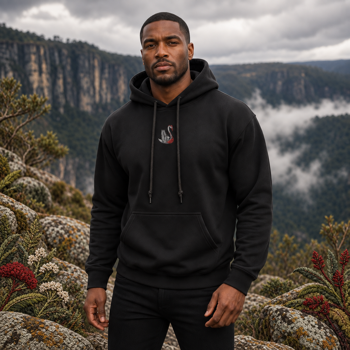 Swan Hoodie in Black – Bright Future product image — realistic model in an embroidered nature scene.