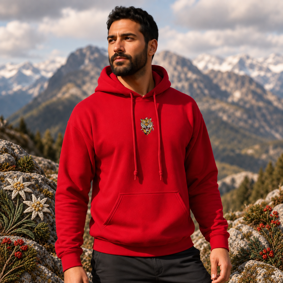 Model wearing the Tiger power animal hoodie in cherry red — realistic model in an embroidered nature scene.