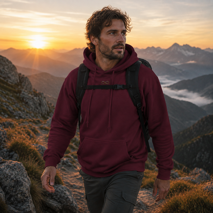 Maroon Infinity hoodie worn hiking at sunset